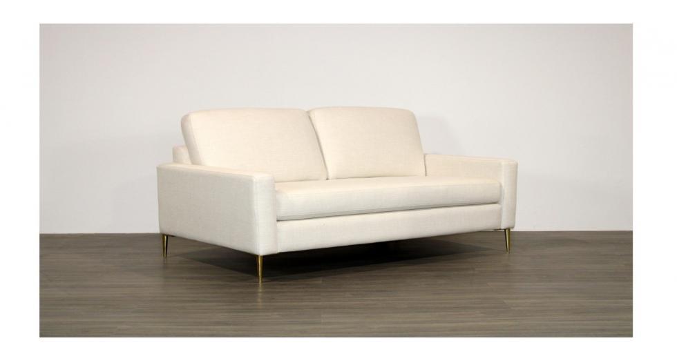 white fabric condo sofa